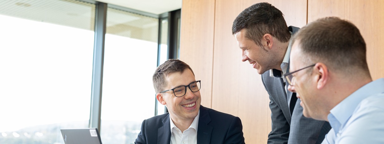 Drei lächelnde BWGV Mitarbeiter